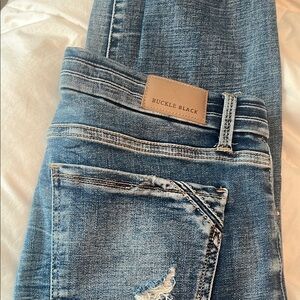 Buckle Blue Skinny Jeans with Vintage Fading